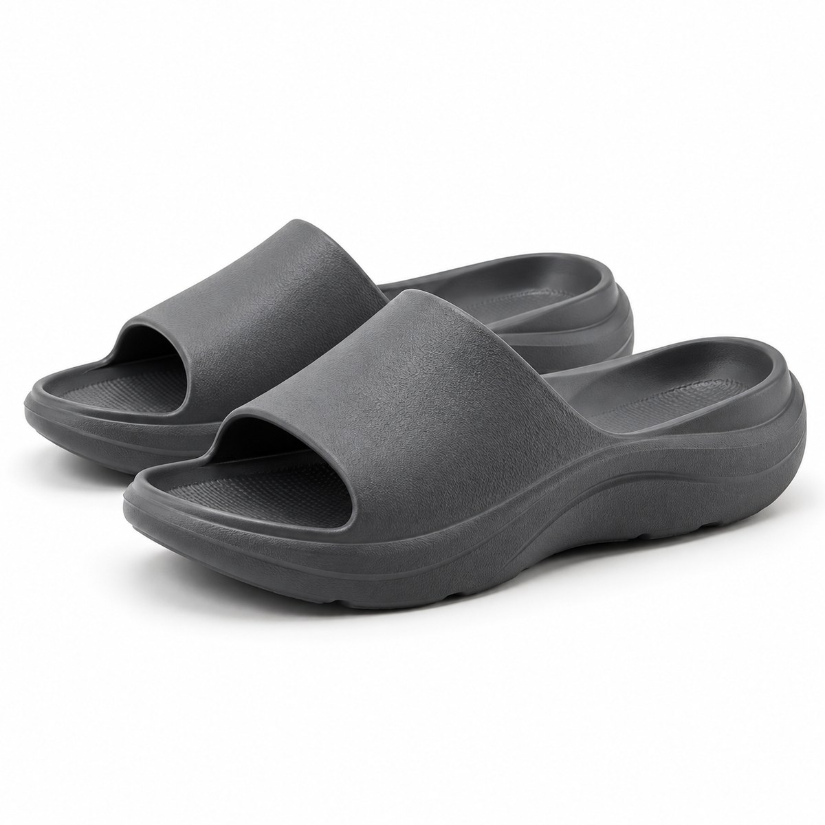Charcoal molded EVA recovery slides with cushioned rocker sole